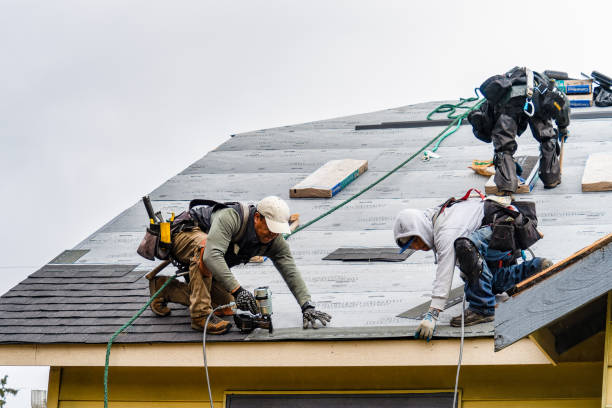 Professional Gutter Installation technician working in Lyndonville, VT